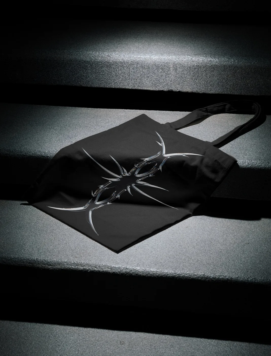 Threshold merch box with the thorn symbol