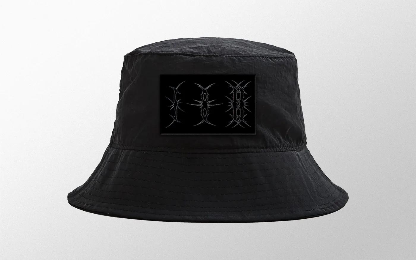 Threshold bucket hat with the rage symbols